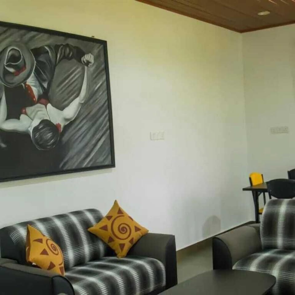 Family Double or Twin Room, Garden View | Living area