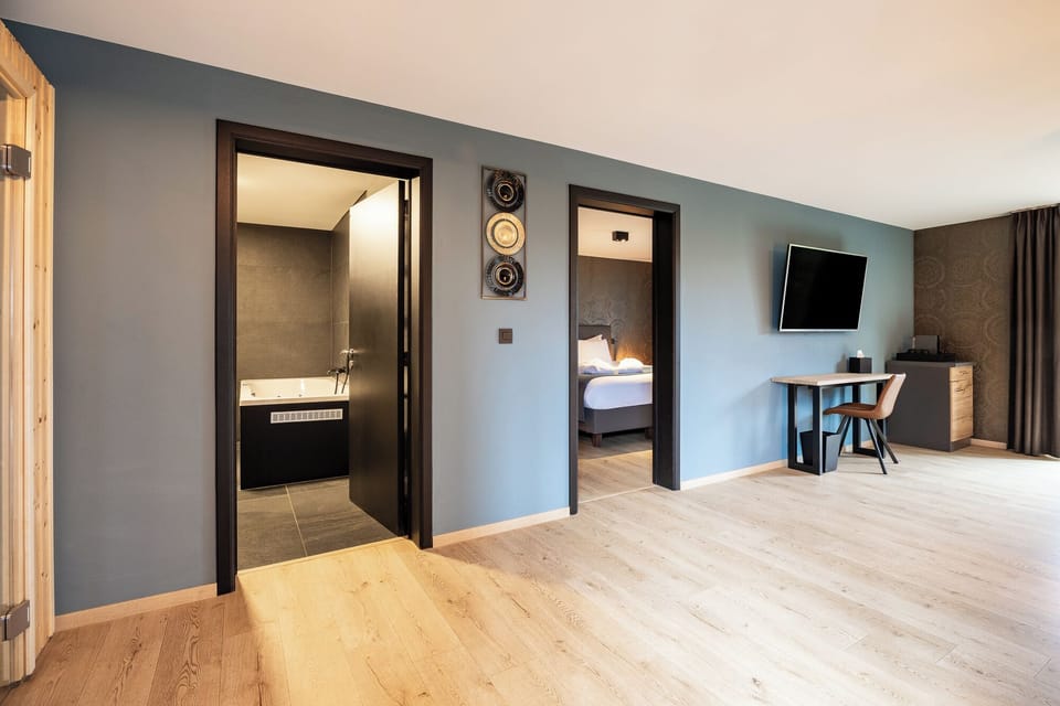 Suite | Desk, laptop workspace, blackout drapes, iron/ironing board
