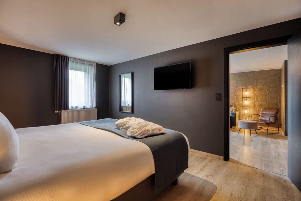 Suite | Desk, laptop workspace, blackout drapes, iron/ironing board