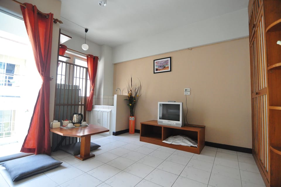 Studio, 1 Queen Bed | Living area | LCD TV