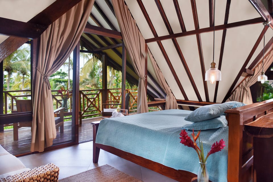 Suite, Beach View | In-room safe, WiFi (free), bed sheets