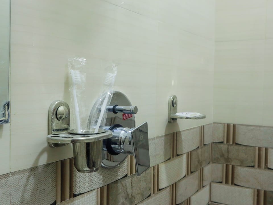 Standard Double Room, City View | Bathroom | Shower, towels, soap, shampoo