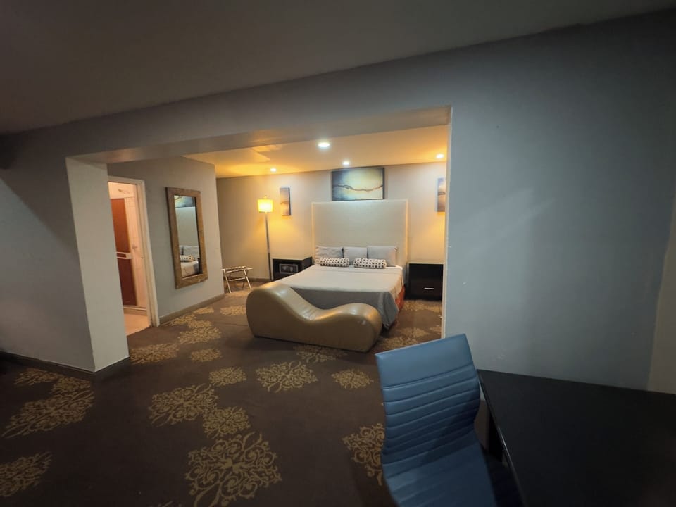 Superior Studio Suite | In-room safe, desk, laptop workspace, blackout drapes