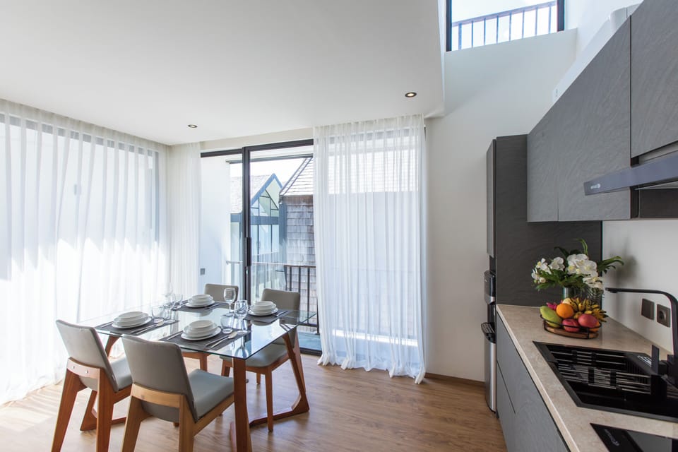 Deluxe Apartment, 2 Bedrooms | Living area | 43-inch Smart TV with digital channels