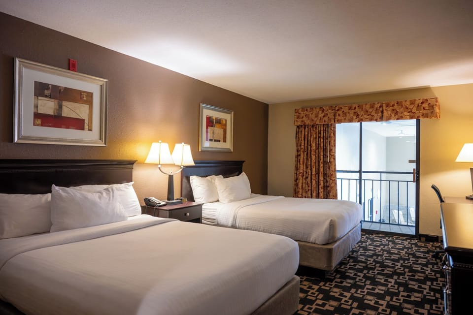 Standard Room, 2 Queen Beds, Non Smoking, Pool View | Desk, iron/ironing board, free cribs/infant beds, rollaway beds
