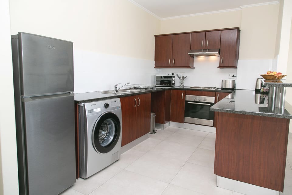 Apartment | Private kitchen | Microwave, coffee/tea maker, electric kettle, toaster