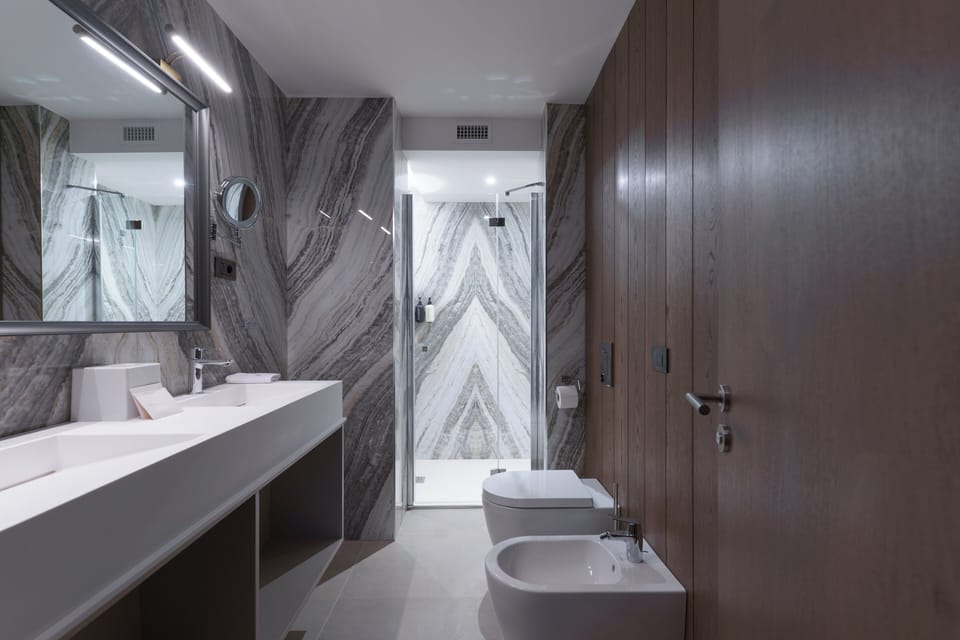 Shower, free toiletries, hair dryer, slippers