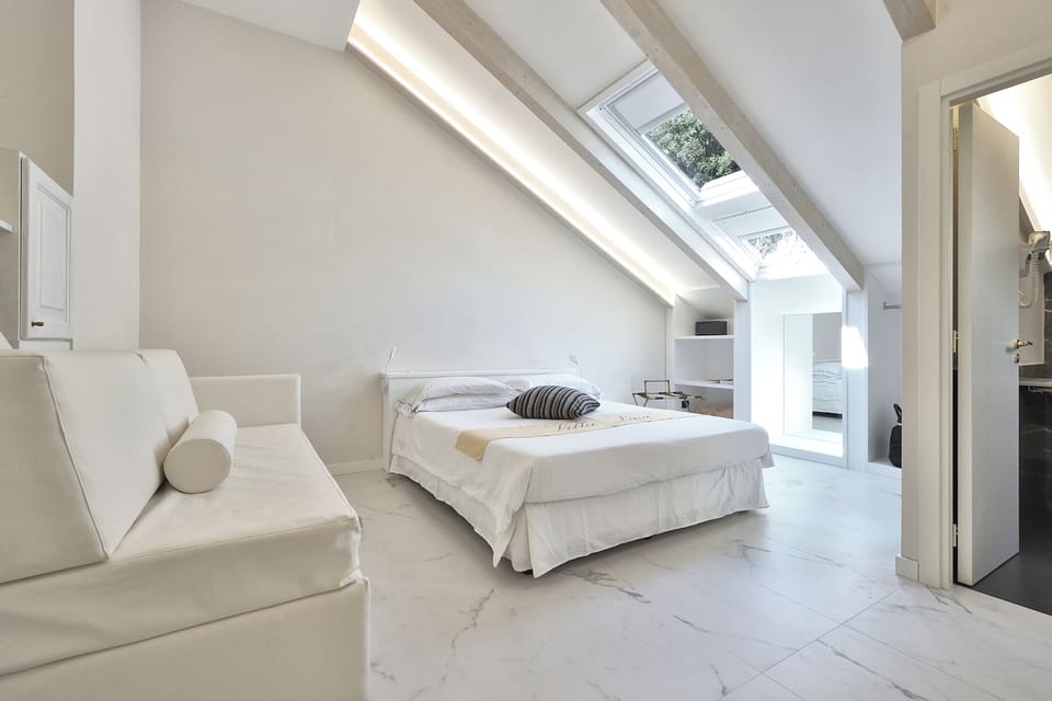 Quadruple Room | Premium bedding, minibar, in-room safe, desk