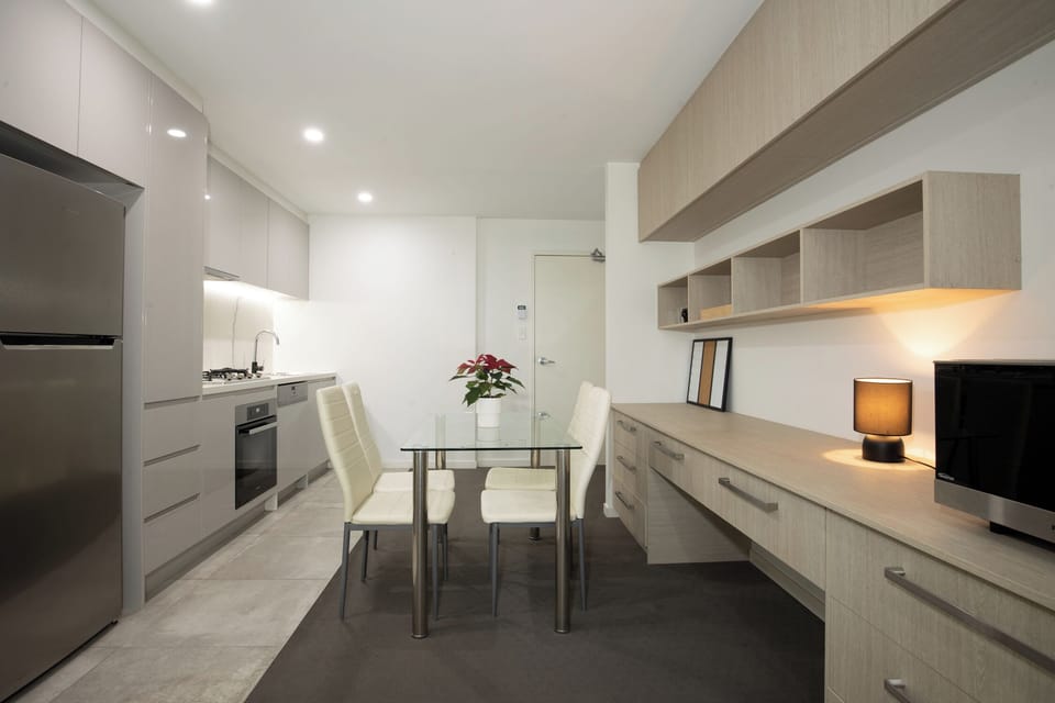 Apartment, 1 Queen Bed | Living area | Flat-screen TV