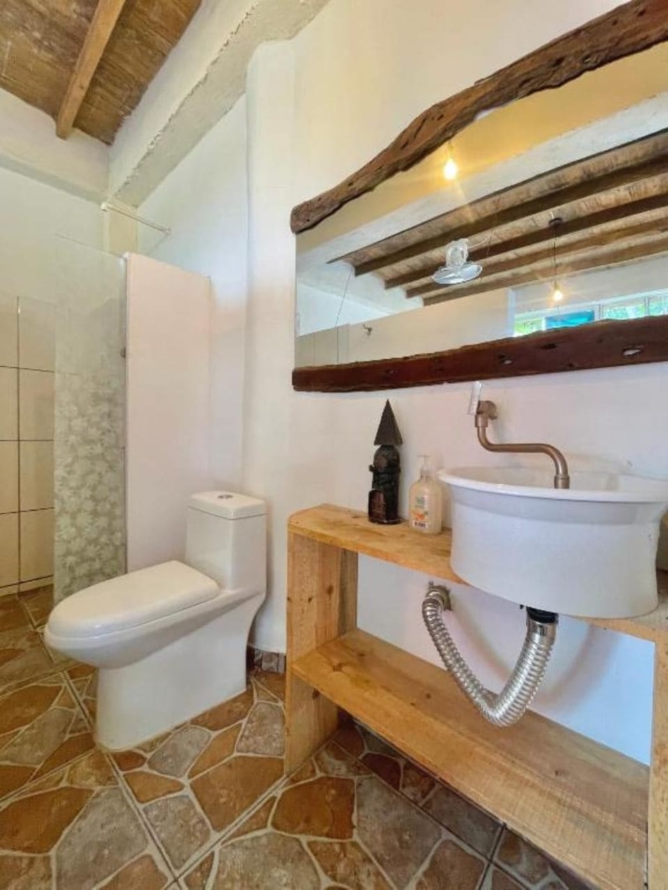 Shower, towels, soap, toilet paper