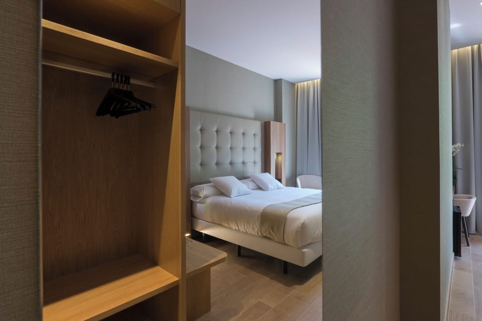 Standard Double Room, Balcony, City View | In-room safe, desk, laptop workspace, soundproofing