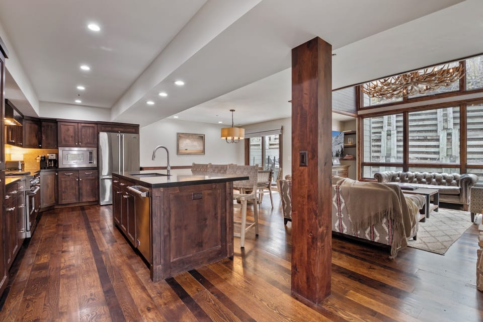 Deluxe Townhome | Private kitchen | Coffee/tea maker, full-size fridge, microwave, oven