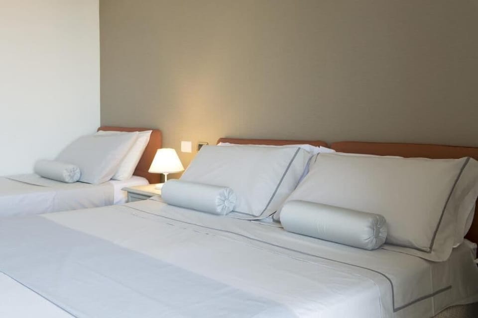 Basic Triple Room | Desk, blackout drapes, soundproofing, free WiFi