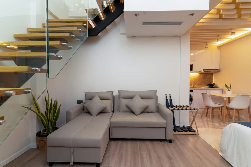 Duplex Apartment with Beach View | Living area | 40-inch Smart TV with digital channels, Netflix, toys