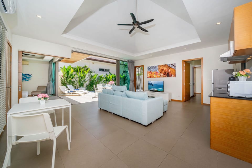 Exclusive Villa, 2 Bedrooms, Pool View | Living area | 46-inch flat-screen TV with cable channels