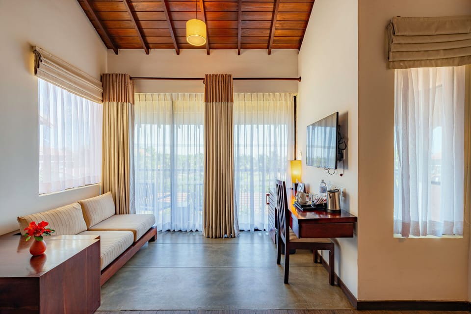 Premium Double or Twin Room, 1 Bedroom, Beach View | Minibar, in-room safe, desk, blackout drapes