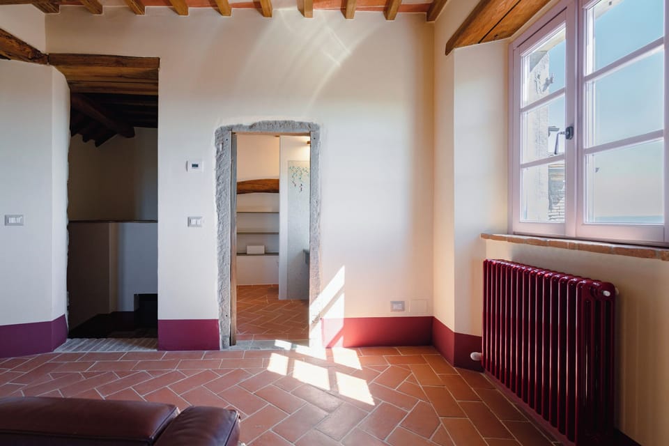 Apartment, Balcony, Hill View | Living area | 32-inch flat-screen TV with cable channels
