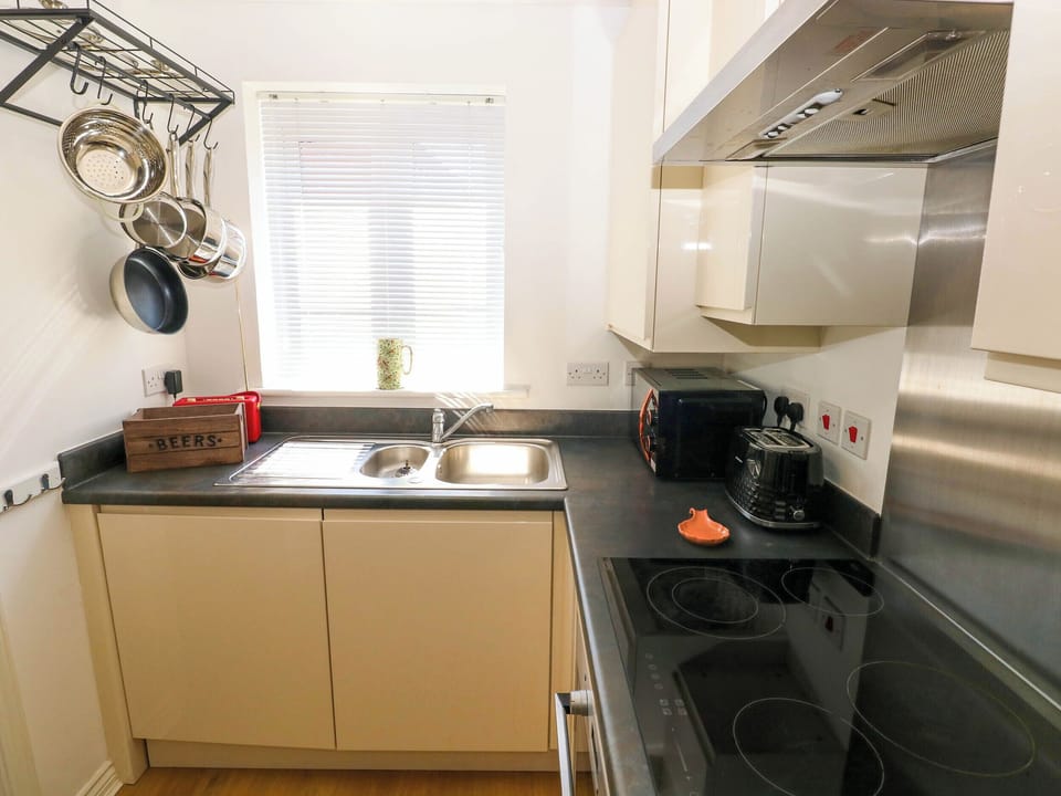 Fridge, microwave, toaster, cookware/dishes/utensils