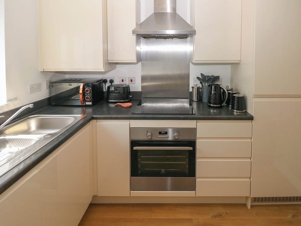 Fridge, microwave, toaster, cookware/dishes/utensils
