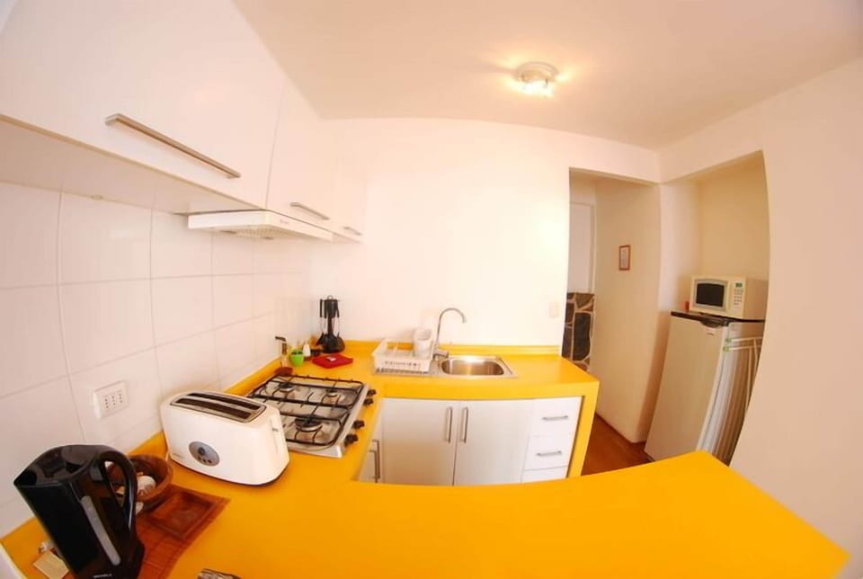 Fridge, microwave, stovetop, cookware/dishes/utensils