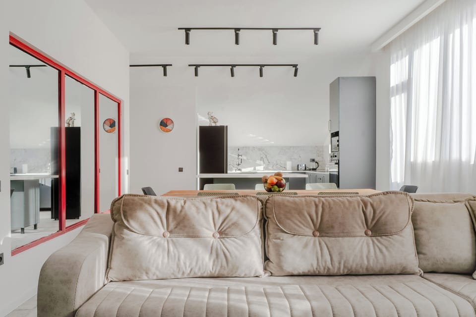 Family Apartment, Balcony, City View | Living area | Flat-screen TV