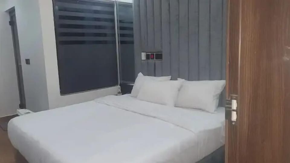 Economy Room, Balcony, City View | Desk, laptop workspace, blackout drapes, soundproofing