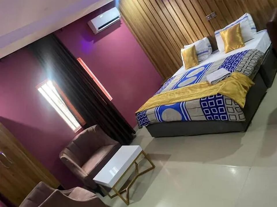 Deluxe Room, Balcony, City View | Desk, laptop workspace, blackout drapes, soundproofing