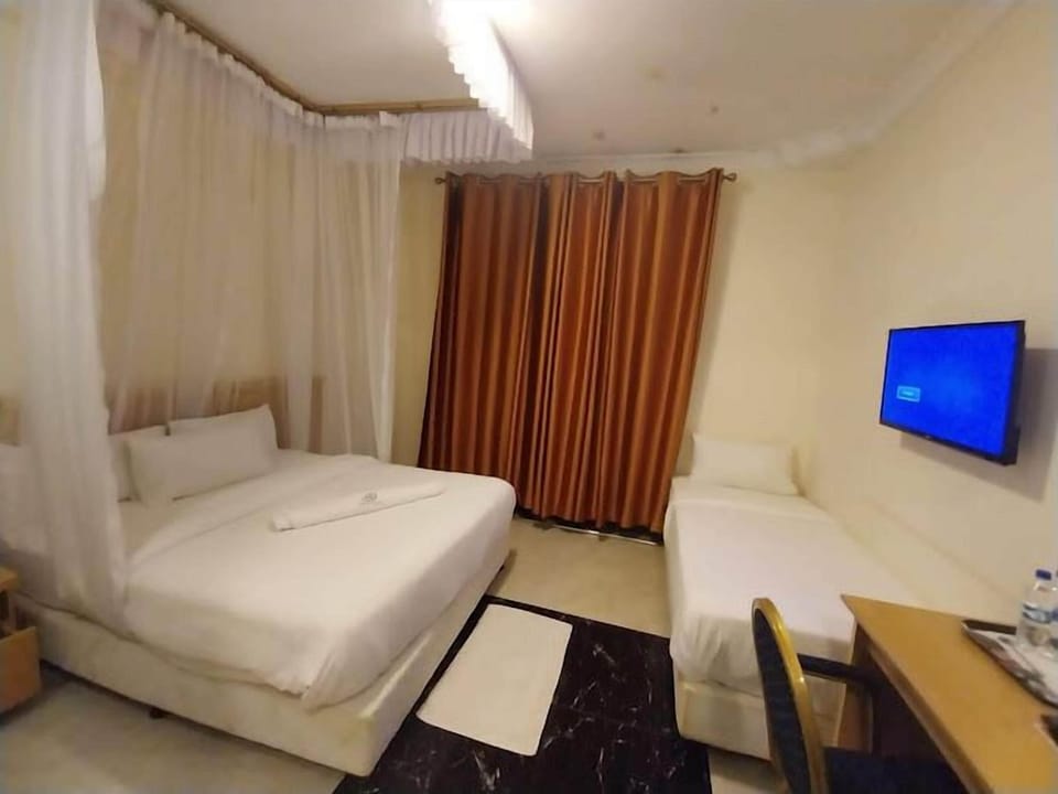 Family Twin Room, Pool View | Free WiFi, bed sheets