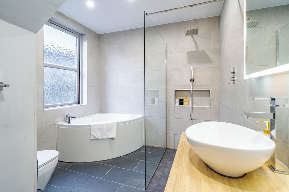 Deluxe Twin with Walk-in Shower | Egyptian cotton sheets, premium bedding, down comforters, free WiFi