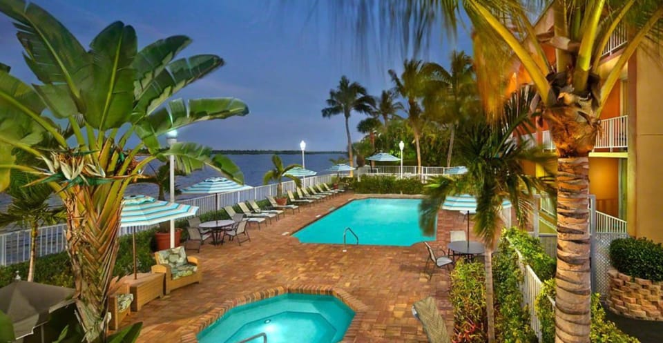 Outdoor pool, open 7 AM to 11 PM, pool umbrellas, sun loungers