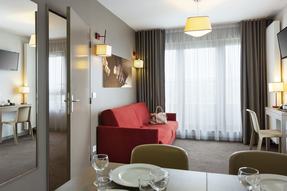 Apartment, 1 Bedroom | Desk, laptop workspace, blackout drapes, soundproofing