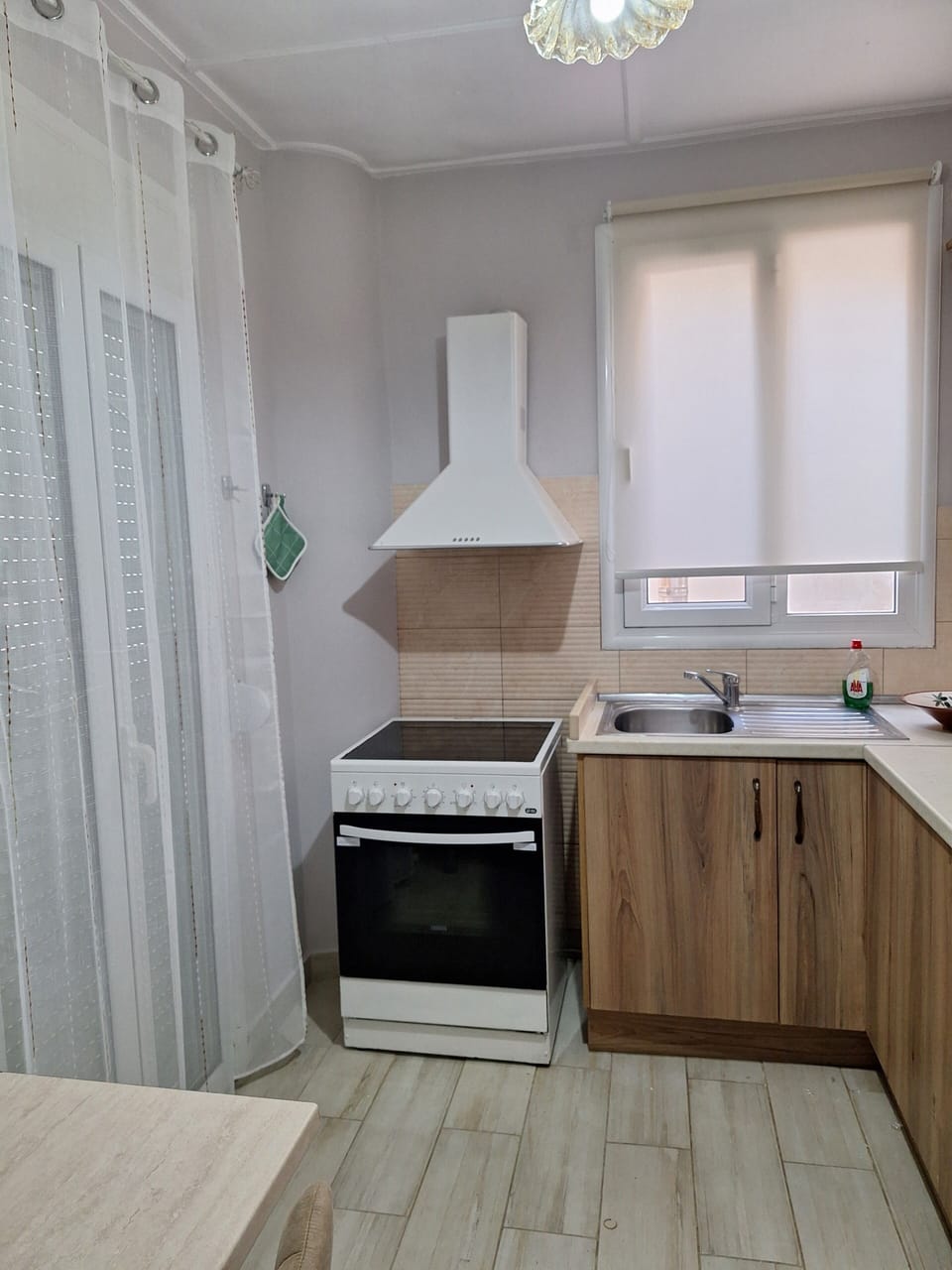 Family Apartment, Balcony, City View | Private kitchen | Full-size fridge, oven, stovetop, cookware/dishes/utensils