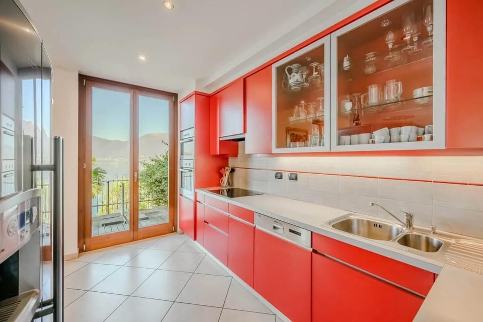 Apartment, Multiple Beds, Patio, Mountain View (Sopra il Lago 4) | Private kitchen | Coffee/tea maker, fridge, microwave, oven