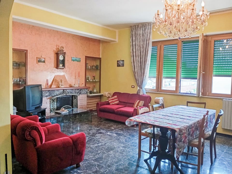 Apartment, Balcony | Living area | 32-inch TV with digital channels