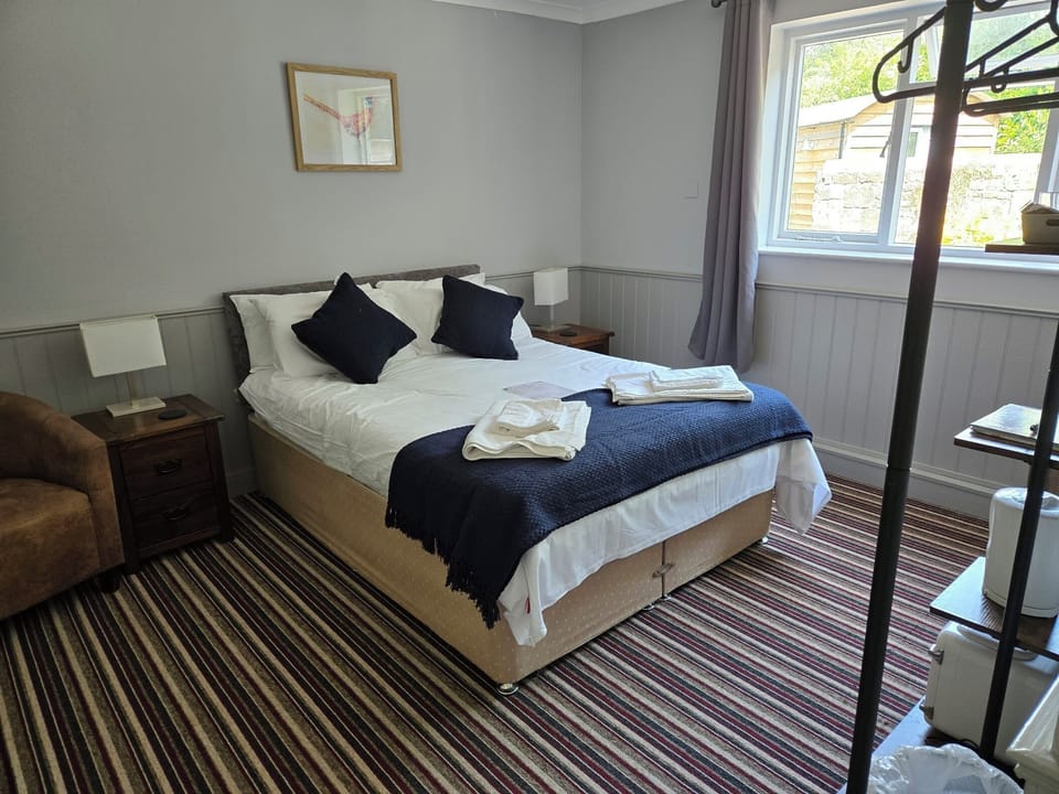 Classic Twin Room, Garden View | Laptop workspace, iron/ironing board, free WiFi
