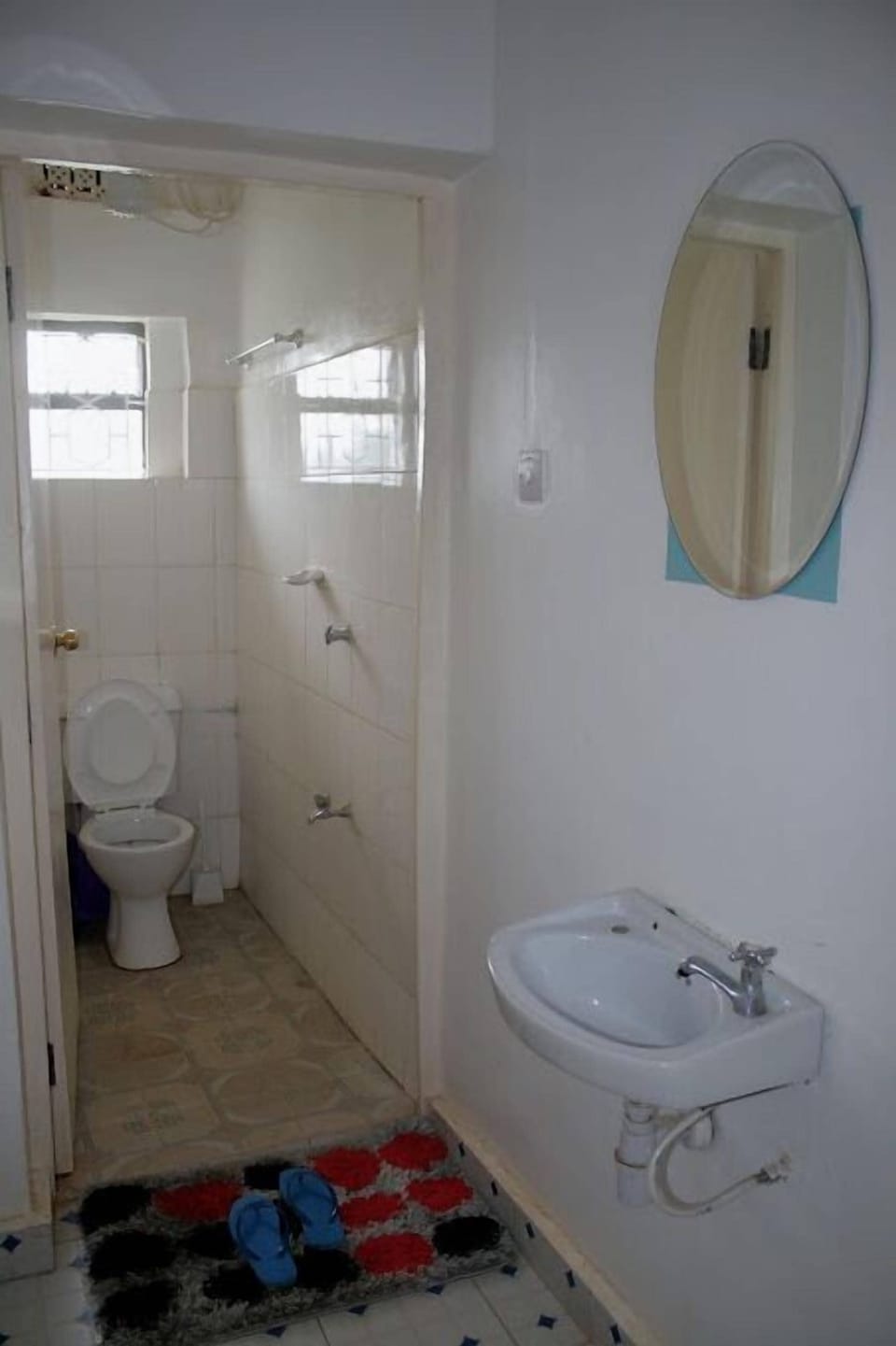 Shower, slippers, towels, soap