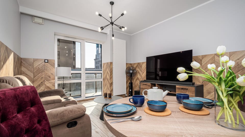 Apartment (A703) | Living area | Flat-screen TV