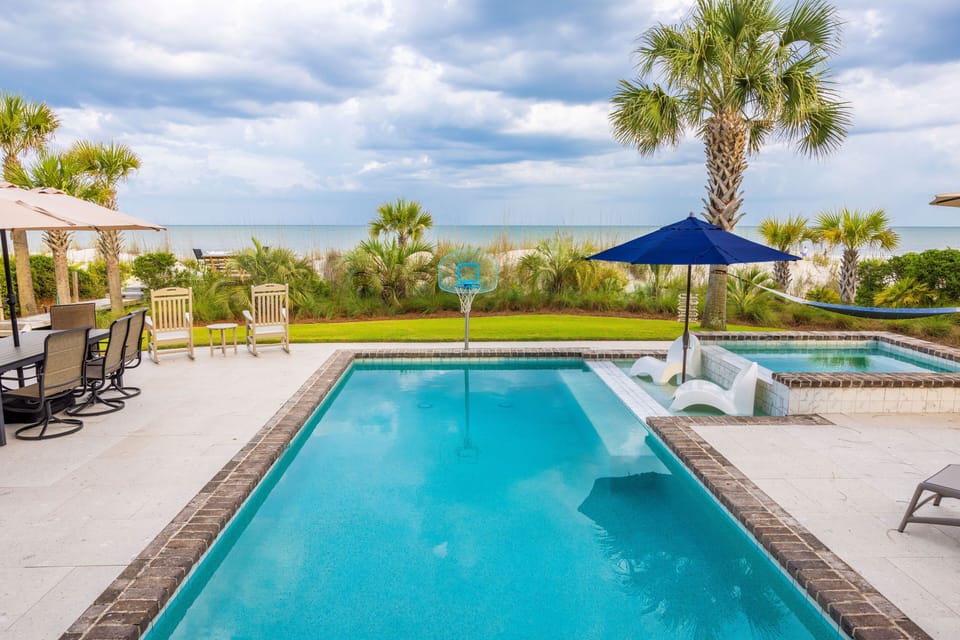 Outdoor pool, pool umbrellas, sun loungers