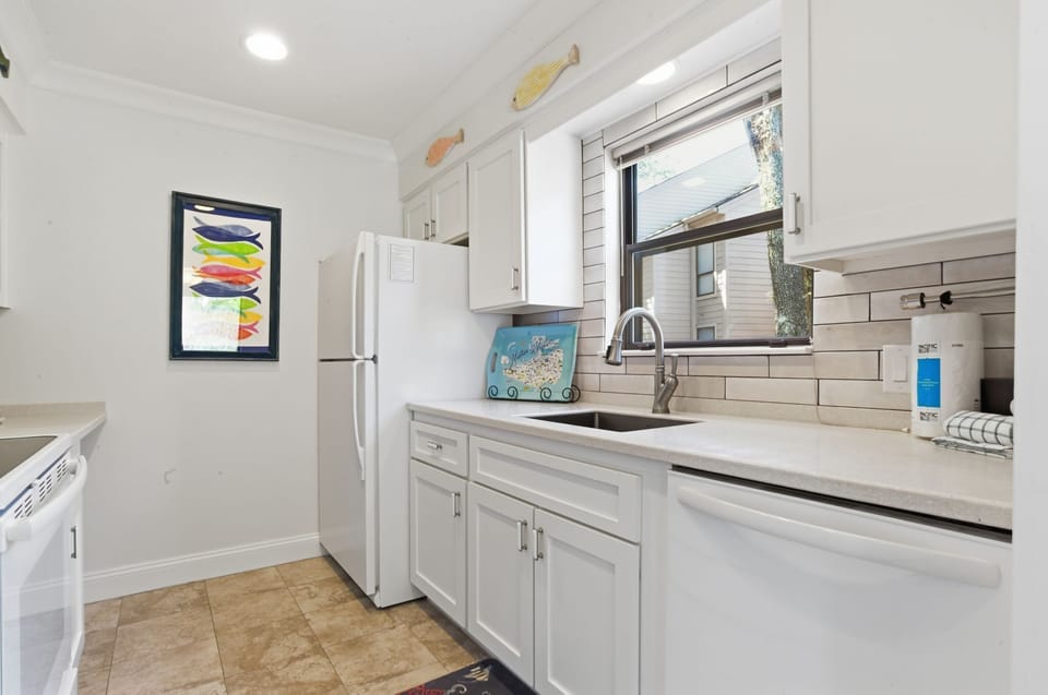Villa, Multiple Beds, Kitchen, Pool View (2410 Lighthouse Tennis) | Private kitchen | Coffee/tea maker, dining table