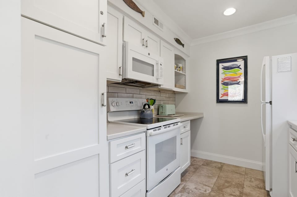 Villa, Multiple Beds, Kitchen, Pool View (2410 Lighthouse Tennis) | Private kitchen | Coffee/tea maker, dining table