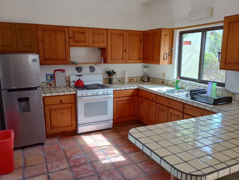 Comfort Apartment, Multiple Beds, Patio, Garden View | Private kitchen | Full-size fridge, microwave, oven, stovetop