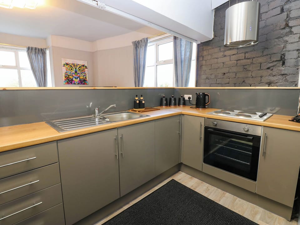 Fridge, microwave, toaster, cookware/dishes/utensils