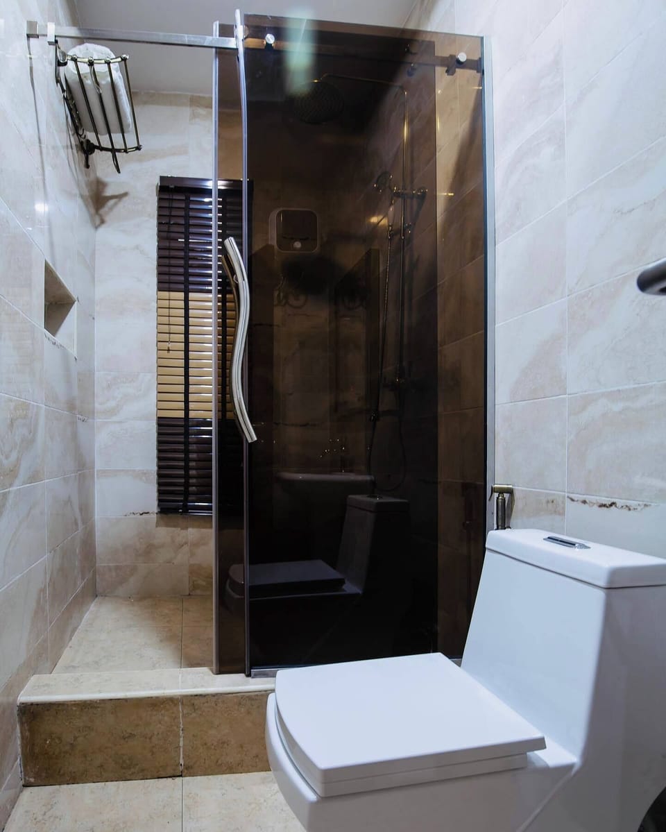 Family Room, Balcony, City View | Bathroom | Free toiletries, hair dryer, towels, soap