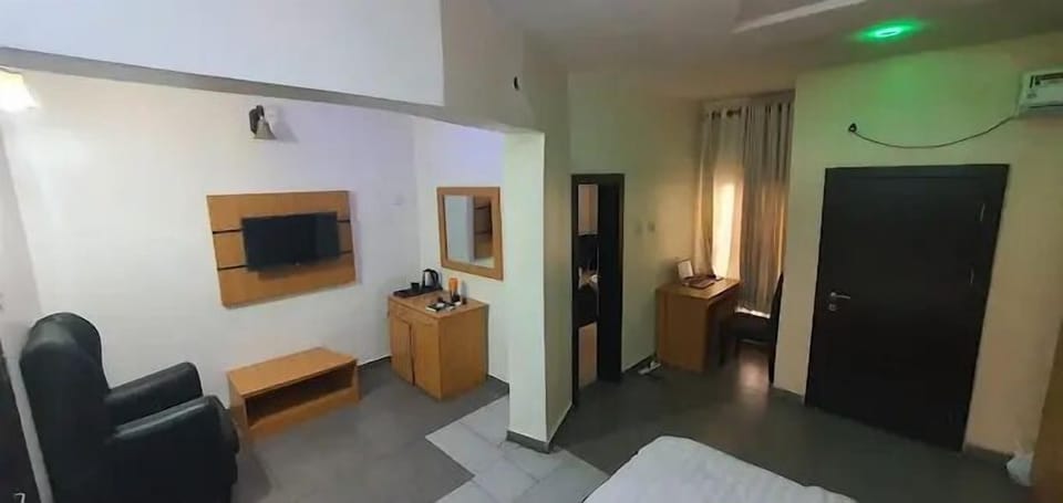 Deluxe Room, Balcony, City View | Desk, laptop workspace, blackout drapes, soundproofing