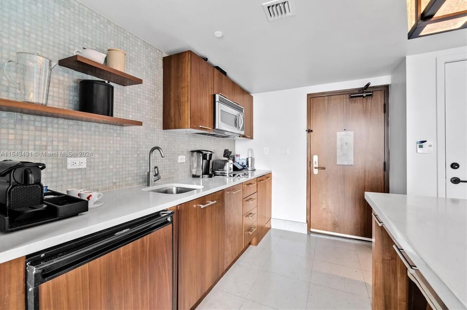 Luxury Suite, 2 Bedrooms, Kitchen, Pool View | Private kitchen | Coffee/tea maker, kitchen island