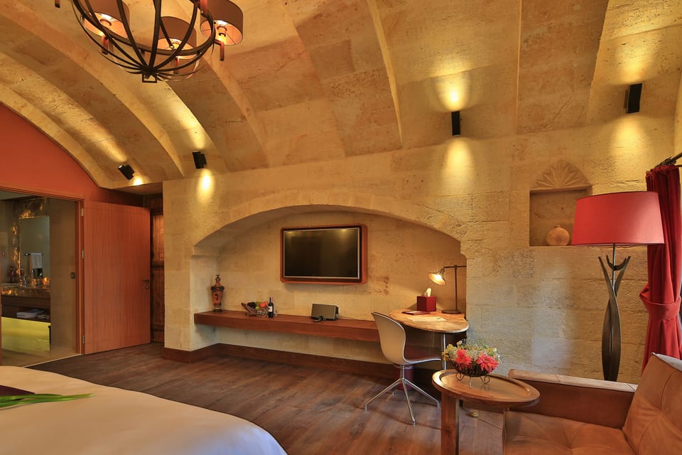 Deluxe Stone Suite ( Inara ) | Egyptian cotton sheets, premium bedding, down comforters, minibar