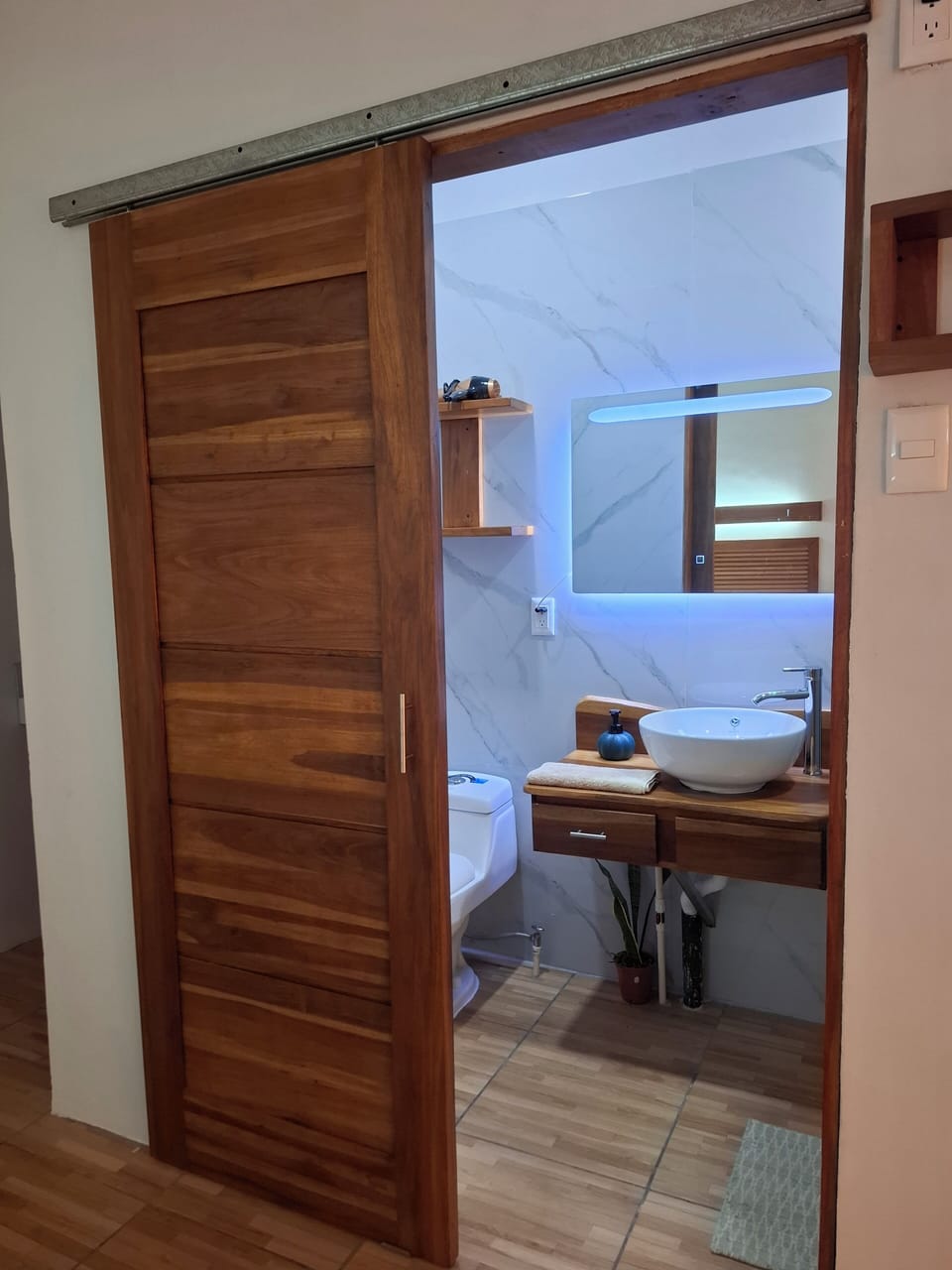 Hair dryer, towels, soap, shampoo