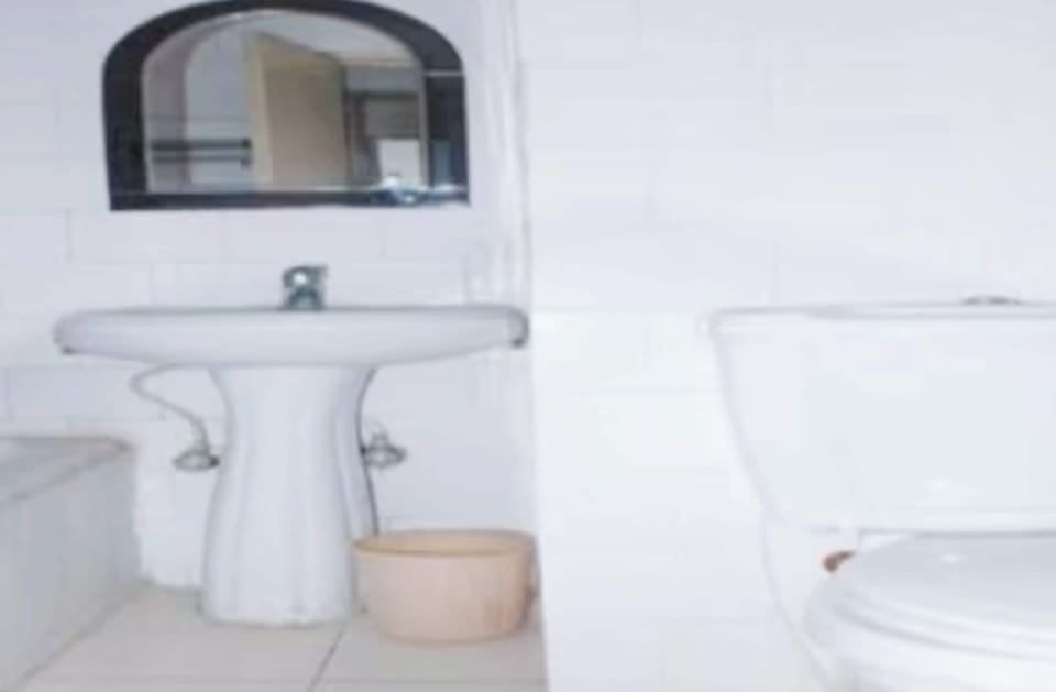 Shower, slippers, towels, soap