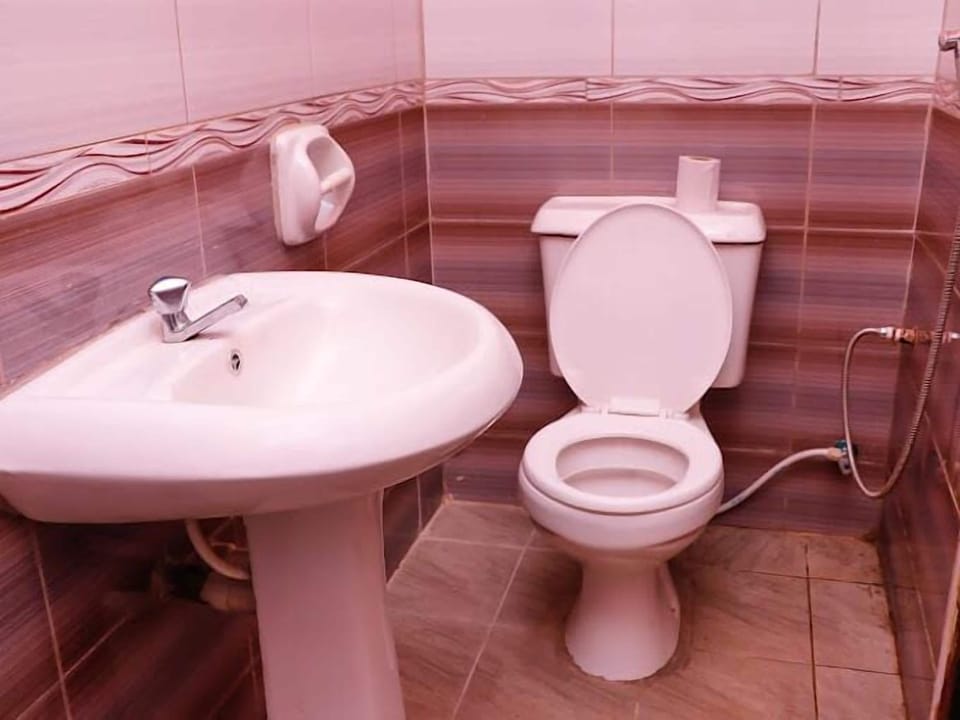 Shower, free toiletries, slippers, towels