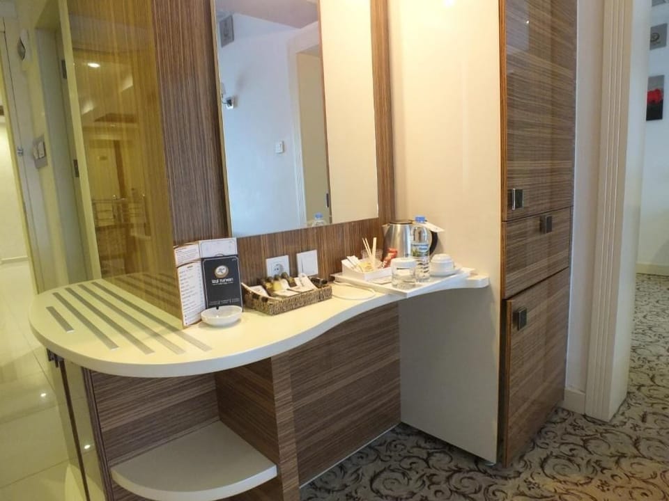 Shower, hair dryer, slippers, towels